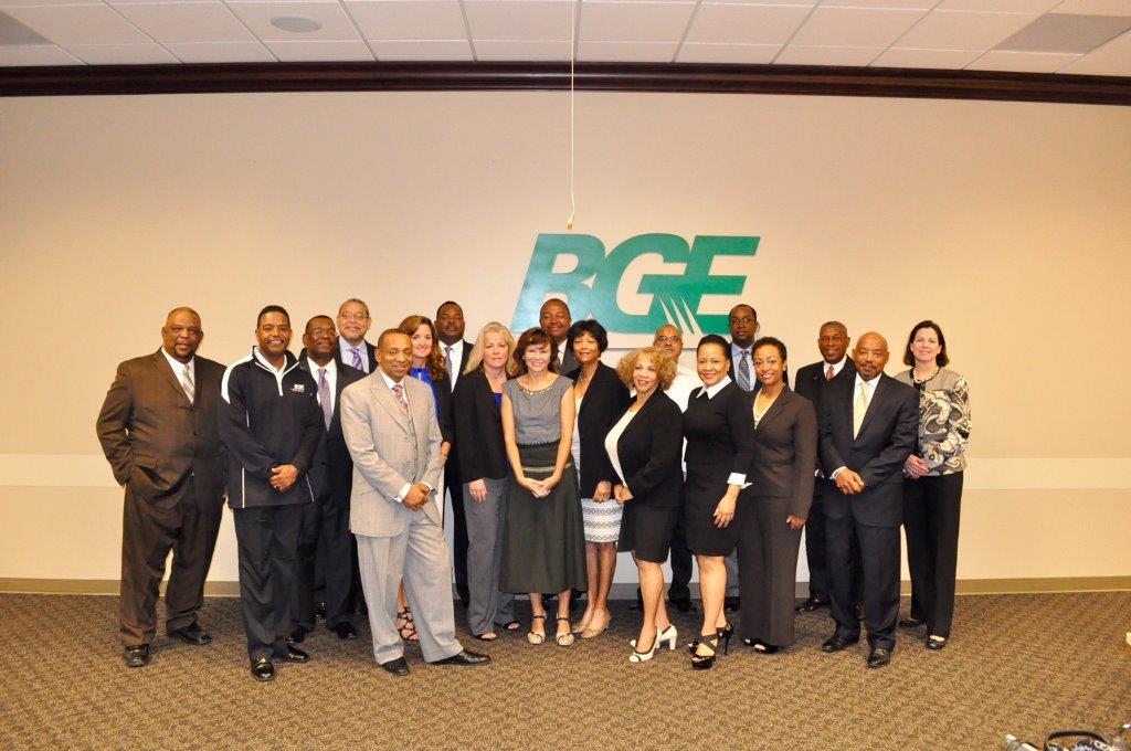 Group of people in front of BGE logo